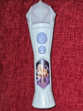 Disney Frozen Sing Along Microphone featuring images of Anna and Elsa from Froze